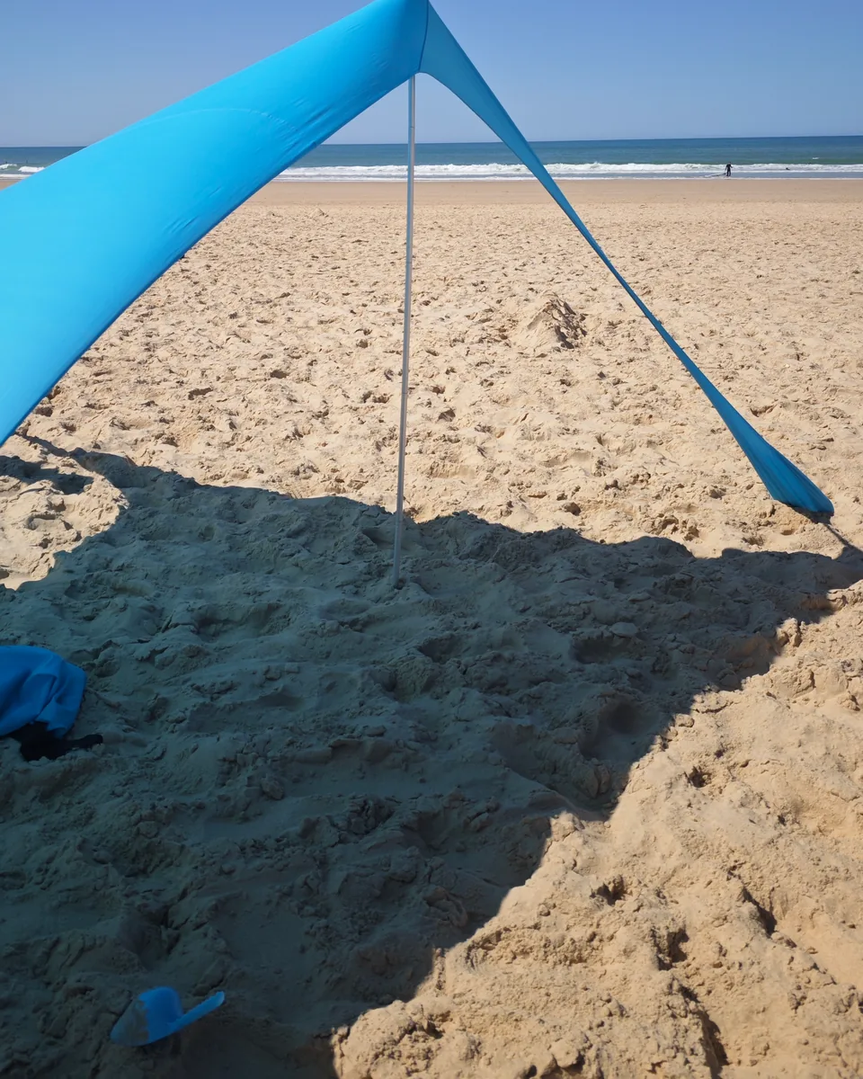 CUUPO Sonnensegel straff gespannt mit Blick zum Meer, alternativer Blickwinkel